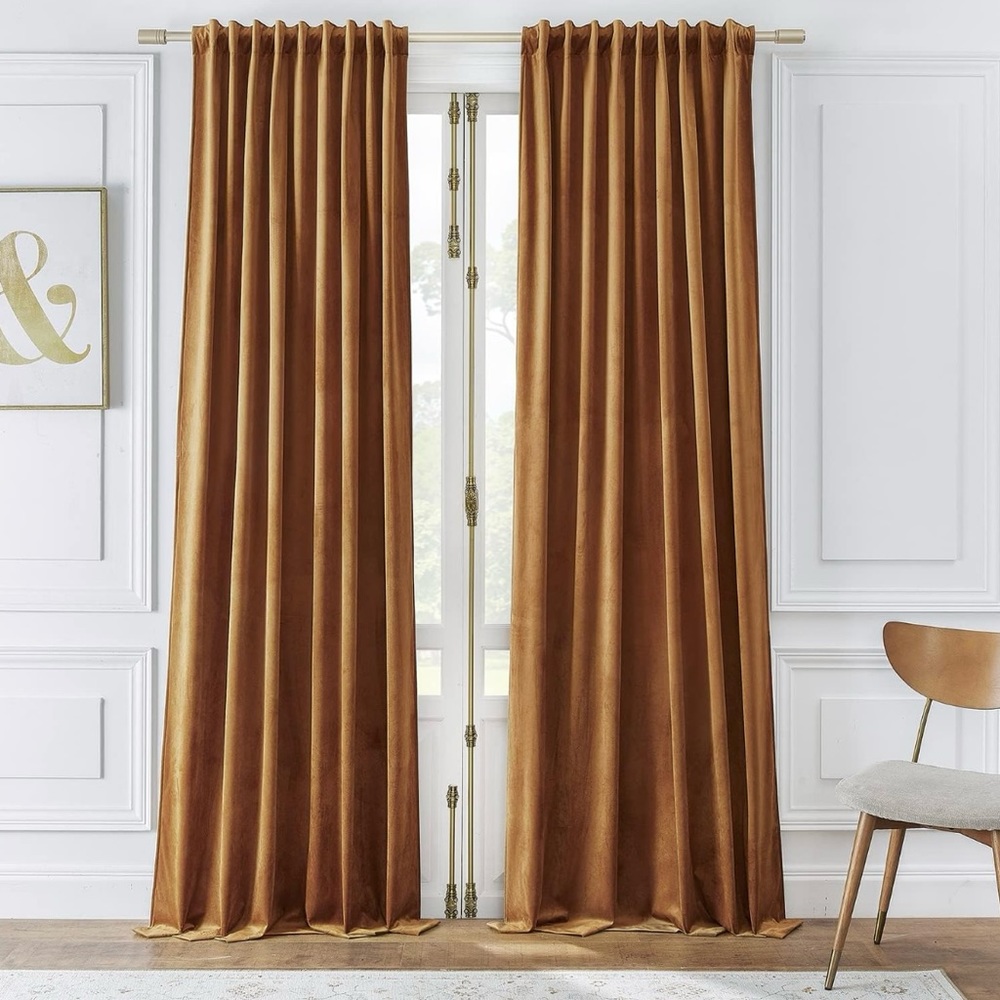 Set of 2 golden brown velvet curtains. W52”xL96”. 2 sets available for purchase.